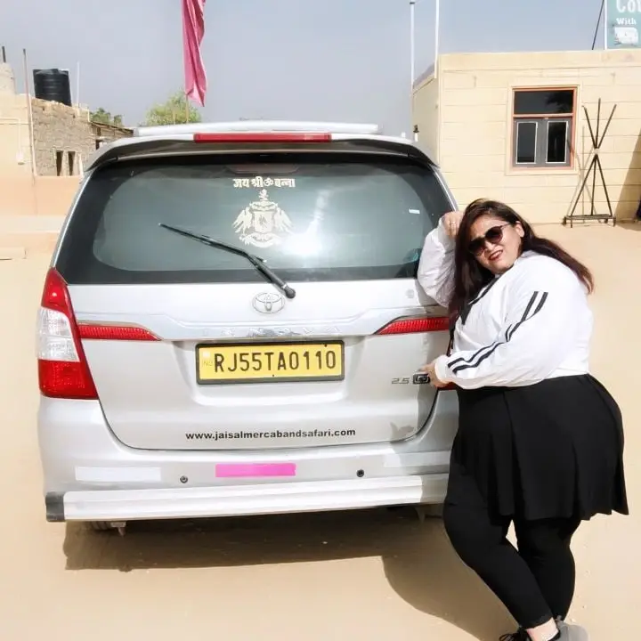 Traveller with the Innova taxi